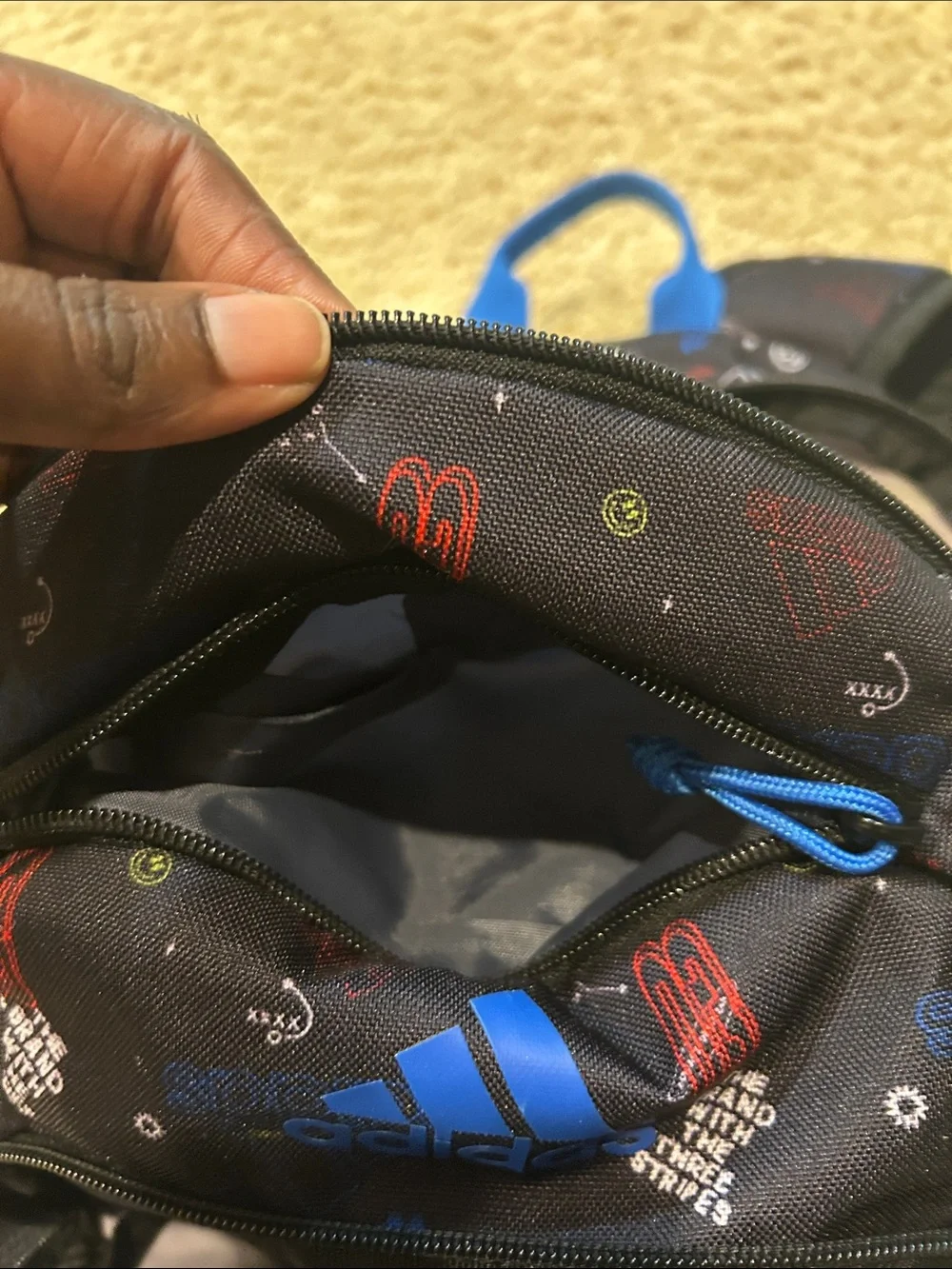 adidas Black Backpack with Bright Blue Stripes and Multicolor Icons